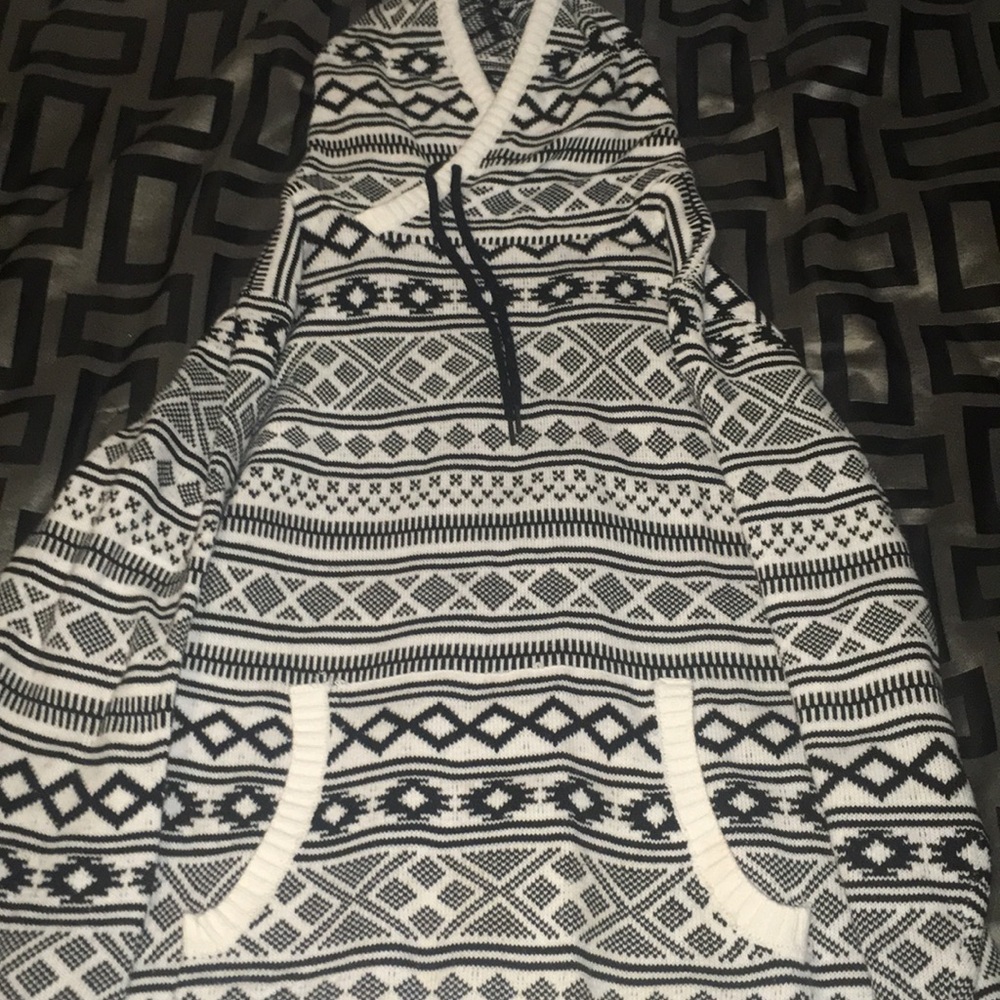 Stitched black and white sweater.